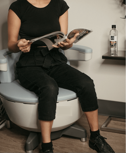 Woman Sitting on Chill Kegels Chair