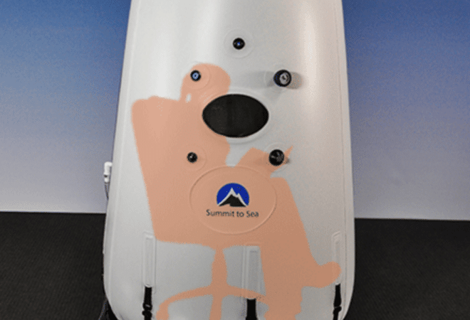 our Mild Hyperbaric Oxygen Therapy with person sitting inside .